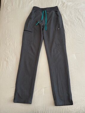 FIGS High Waisted Yola Skinny Scrub Pants in graphite.